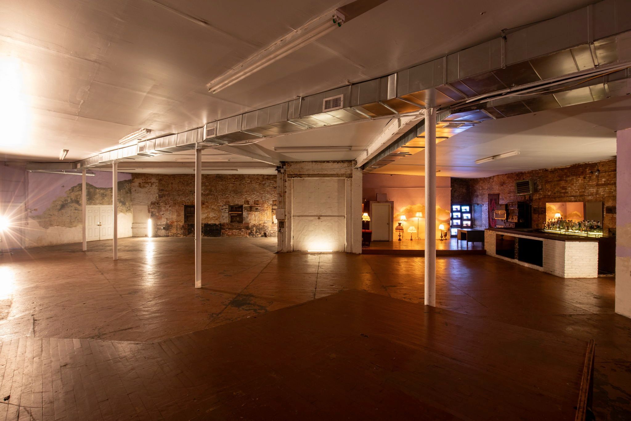 Industrial Warehouse with TV Wall, stage, and bar in Bushwick, Brooklyn, photo 4 of 38